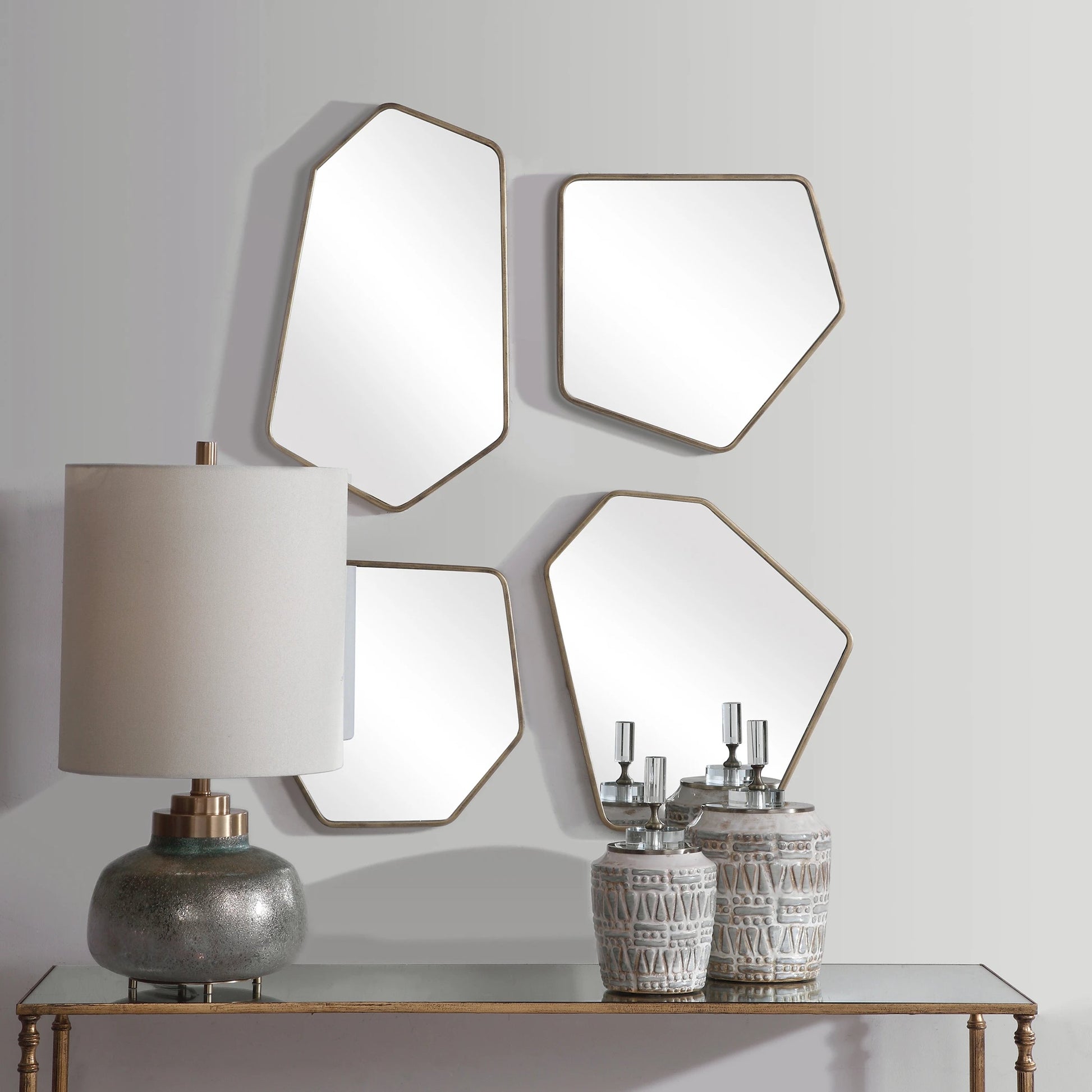Linneah Modern Mirrors by Uttermost. Made from metal, mdf, glass in a modern style.