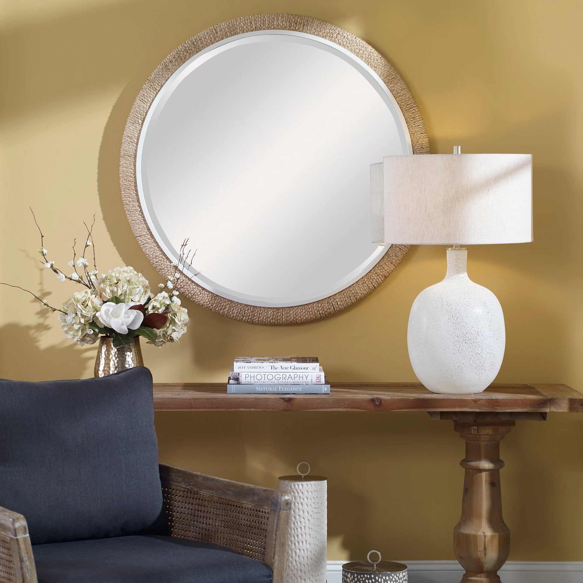 Carbet Round Rope Mirror by Uttermost. Made from iron, mdf, glass, straw in a coastal style.
