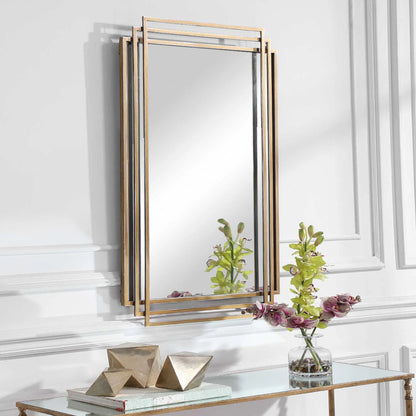 Amherst Brushed Mirror by Uttermost in gold. Made from iron, mdf, mirror in a transitional style.