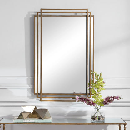 Amherst Brushed Mirror by Uttermost in gold. Made from iron, mdf, mirror in a transitional style.