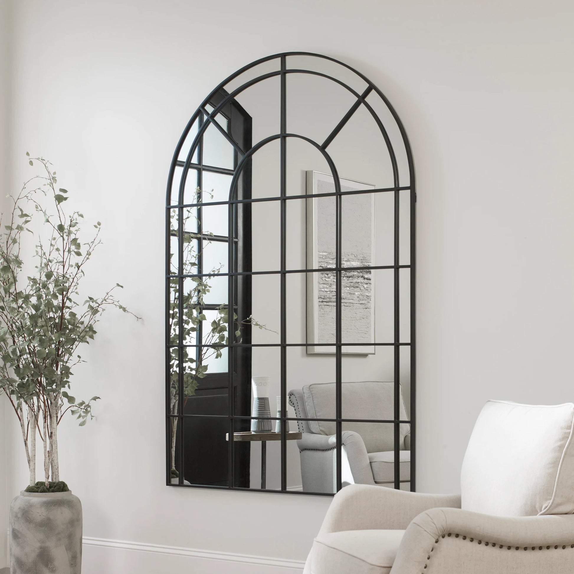 Grantola Arch Mirror by Uttermost in iron. Made from iron, mdf, glass in a cottage & farmhouse style.