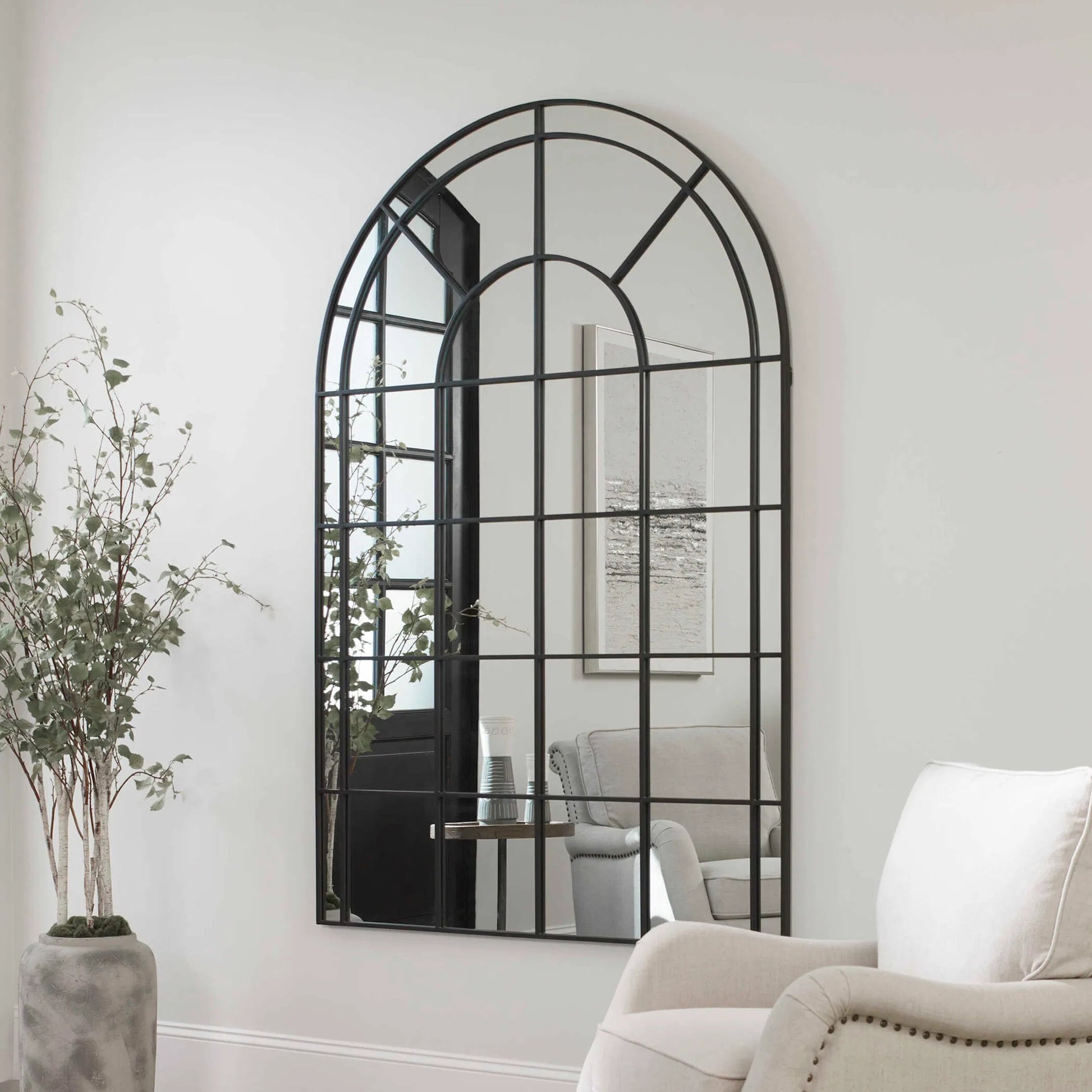 Grantola Arch Mirror by Uttermost in iron. Made from iron, mdf, glass in a cottage & farmhouse style.