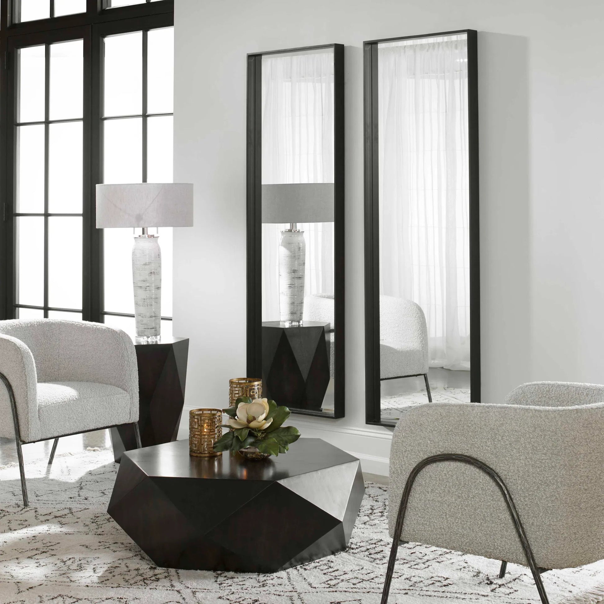 Kahn Mirror by Uttermost in matte black. Made from iron, mdf, glass in a modern style.