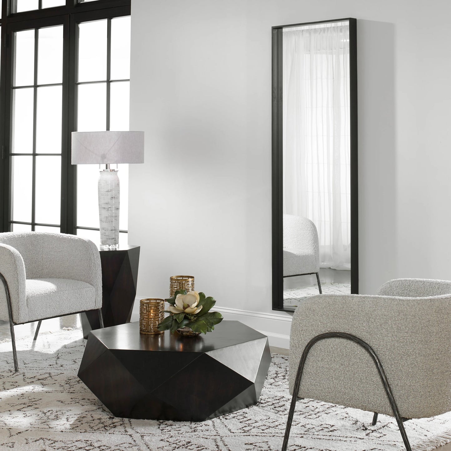 003 SI-1750273 | Lifestyle | Kahn Mirror by Uttermost in matte black. Made from iron, mdf, glass in a modern style.