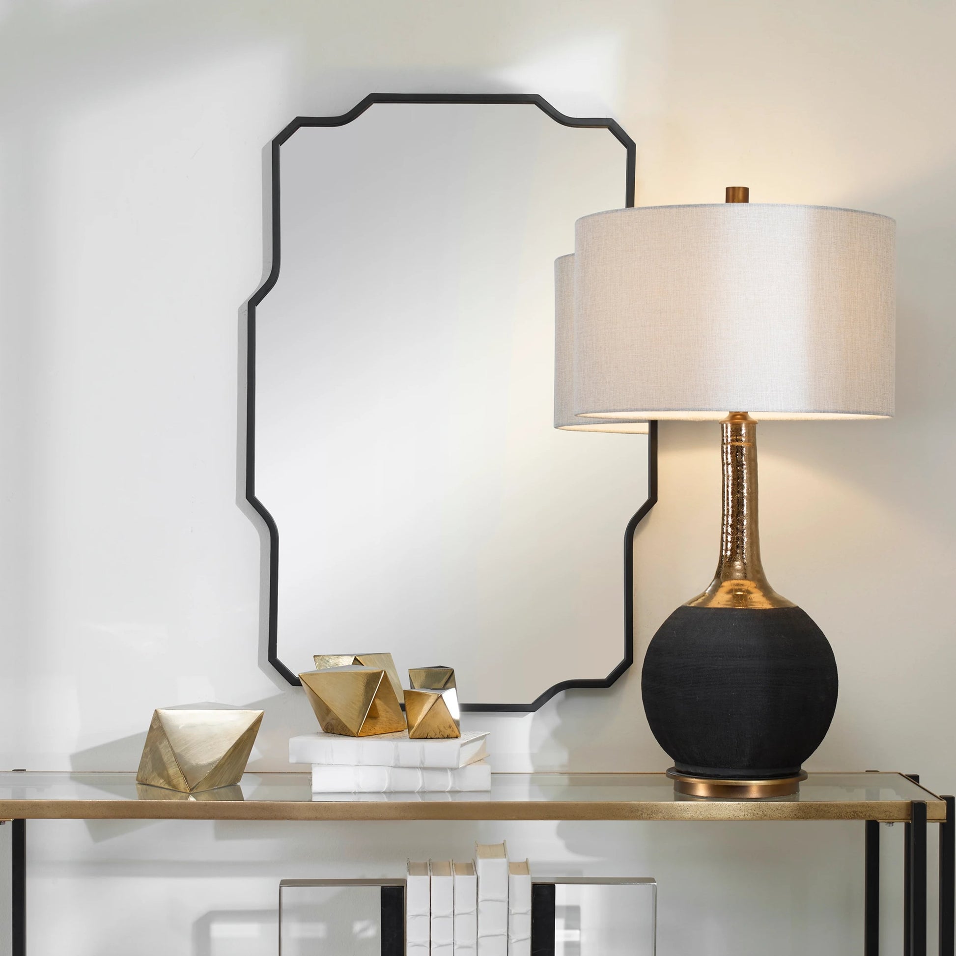 Casmus Wall Mirror by Uttermost in matte black. Made from iron, glass, mdf in a transitional style.