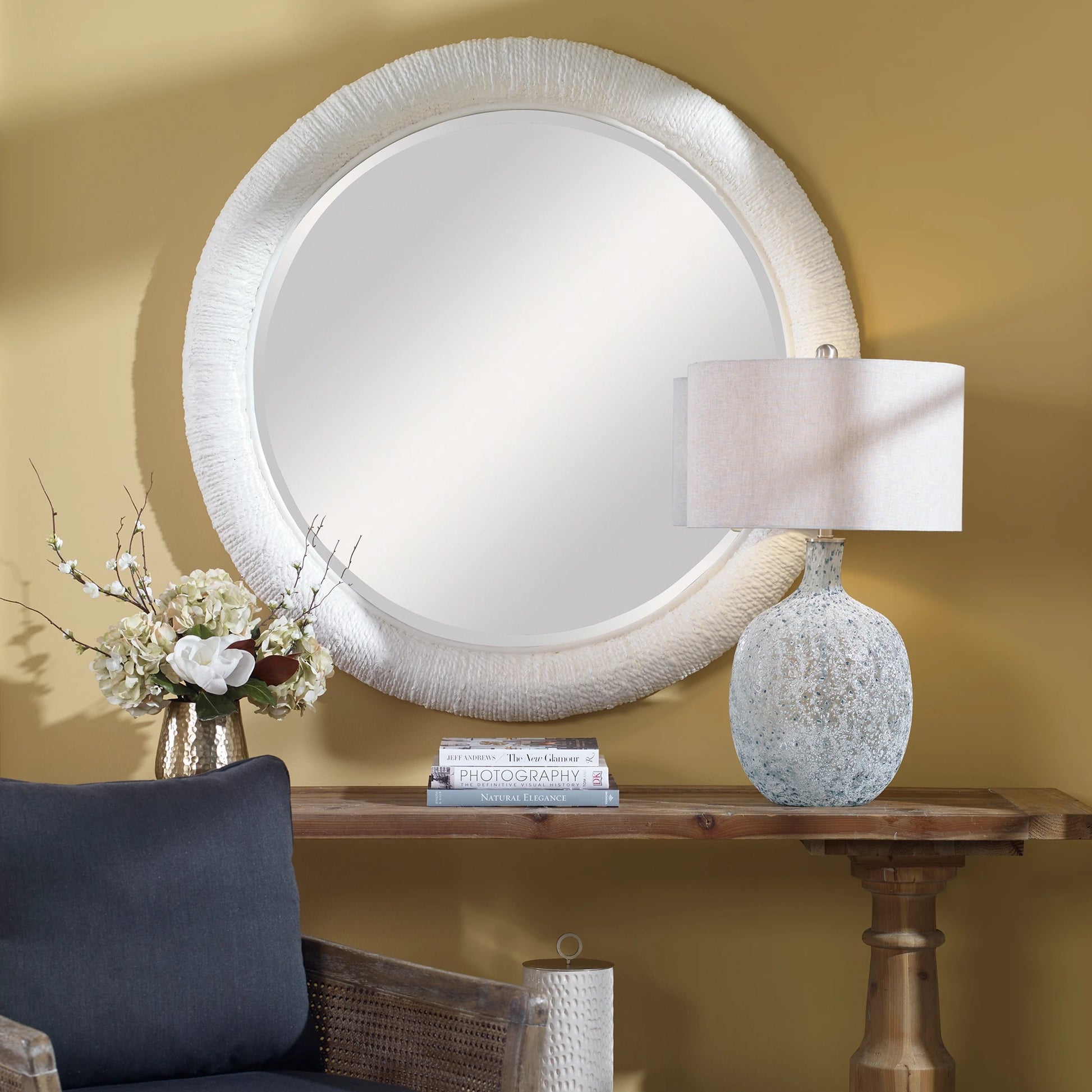Mariner Round Mirror by Uttermost. Made from banana weaving, rattan, plywood, glass in a modern style.