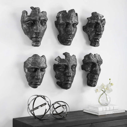 Self-Portrait Wall Decor by Uttermost in steel gray. Made from polyresin in a modern style.