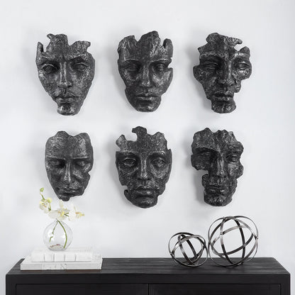 Self-Portrait Wall Decor by Uttermost in steel gray. Made from polyresin in a modern style.