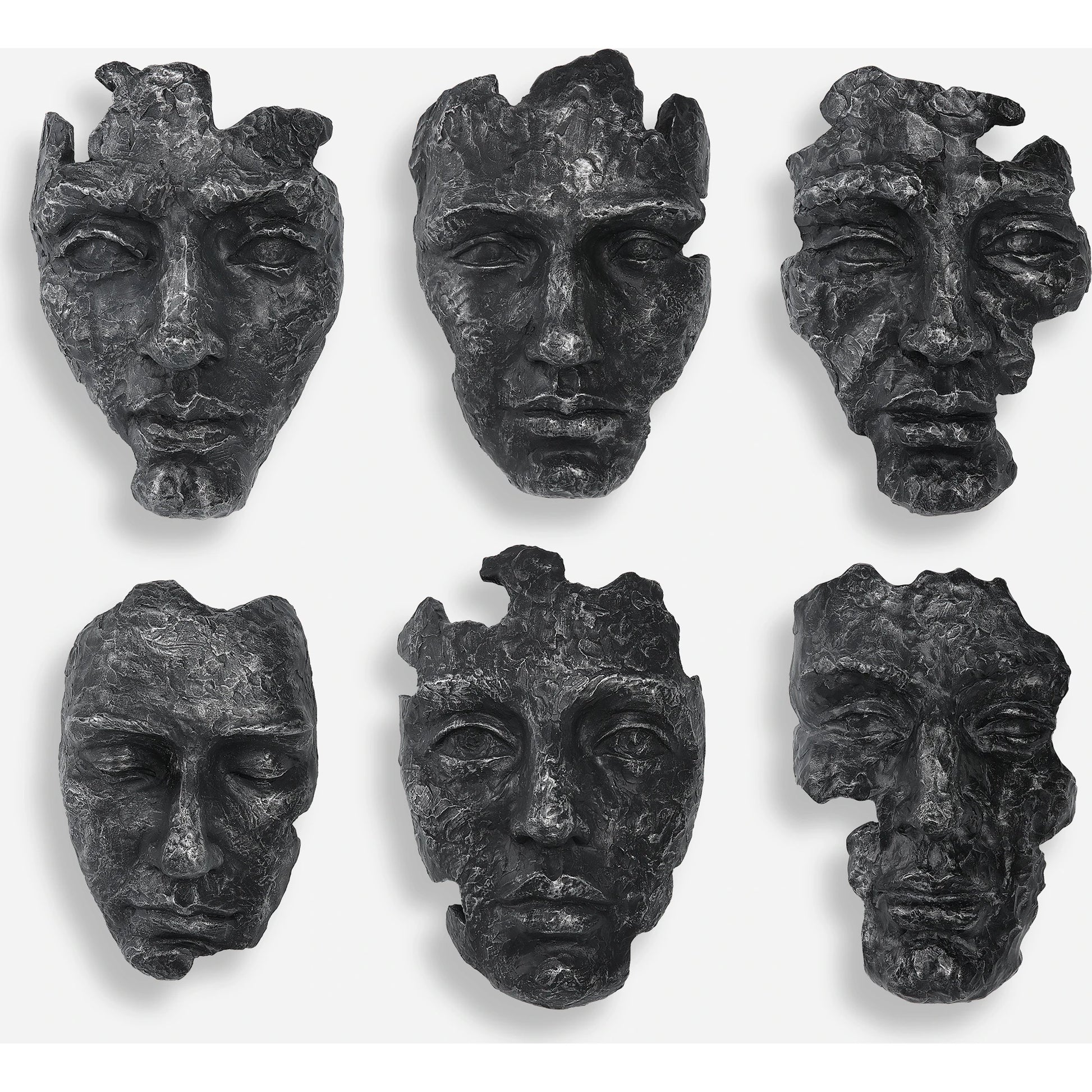 Self-Portrait Wall Decor by Uttermost in steel gray. Made from polyresin in a modern style.