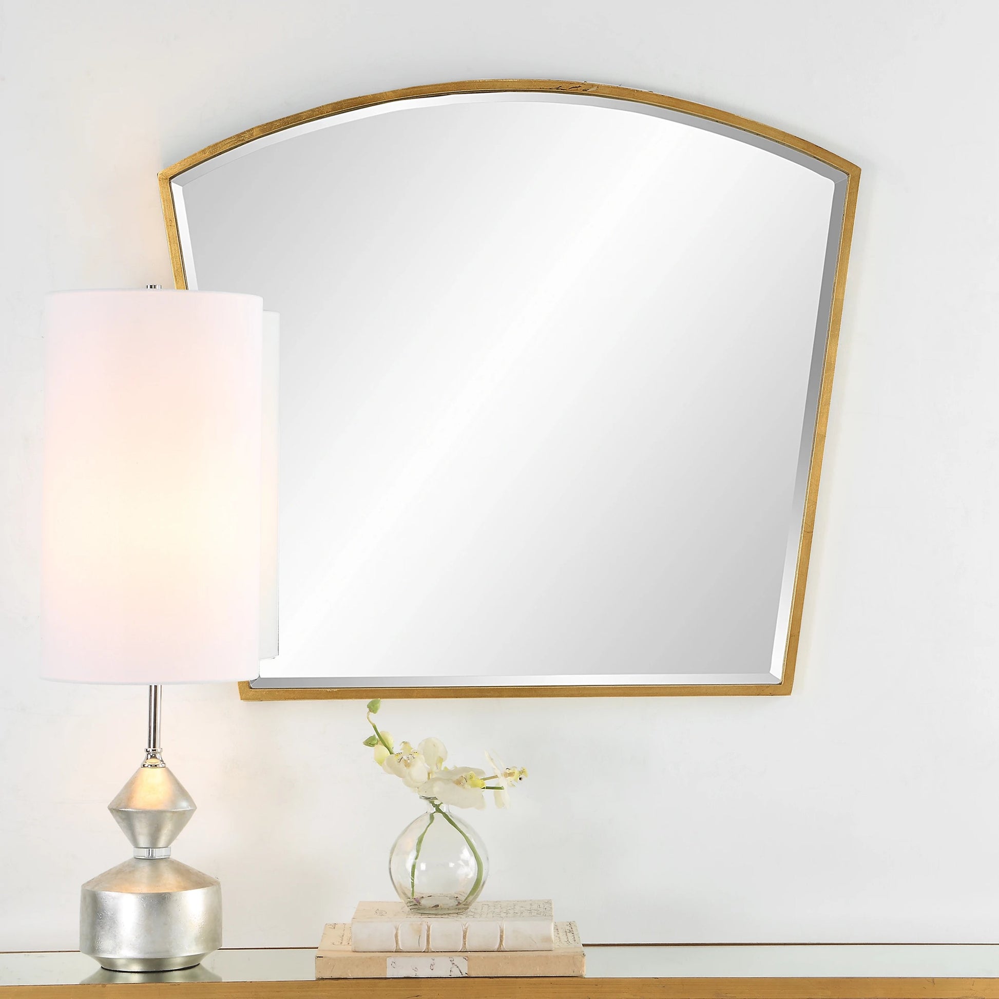 Boundary Arch Mirror by Uttermost in antiqued gold leaf. Made from iron, mdf, mirror in a modern style.