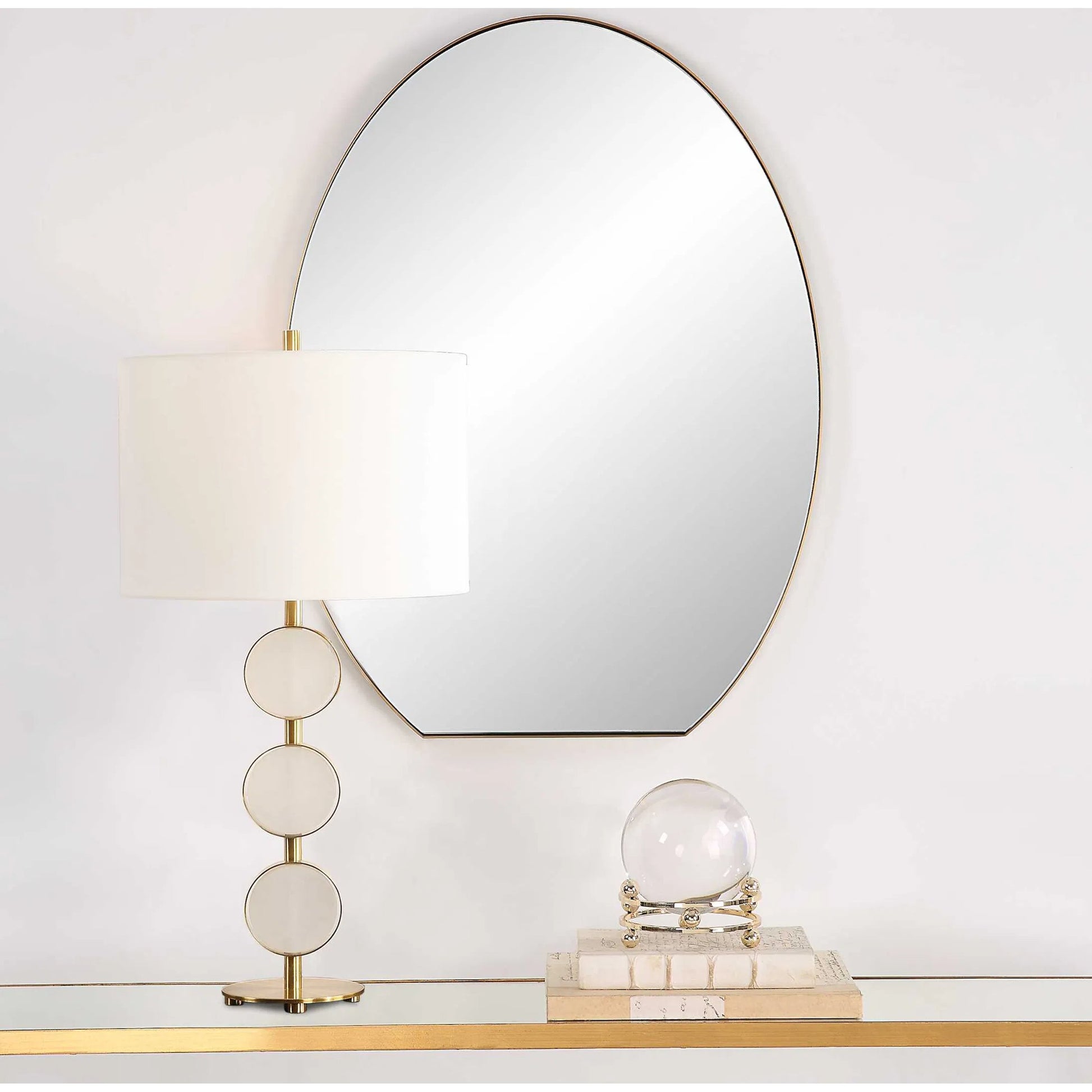 Cabell Oval Mirror by Uttermost in brass. Made from stainless steel, mdf, glass in a modern style.