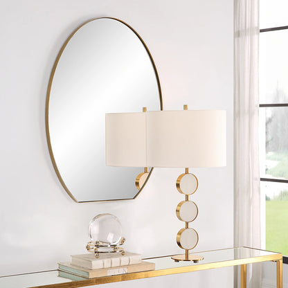 Cabell Oval Mirror by Uttermost in brass. Made from stainless steel, mdf, glass in a modern style.