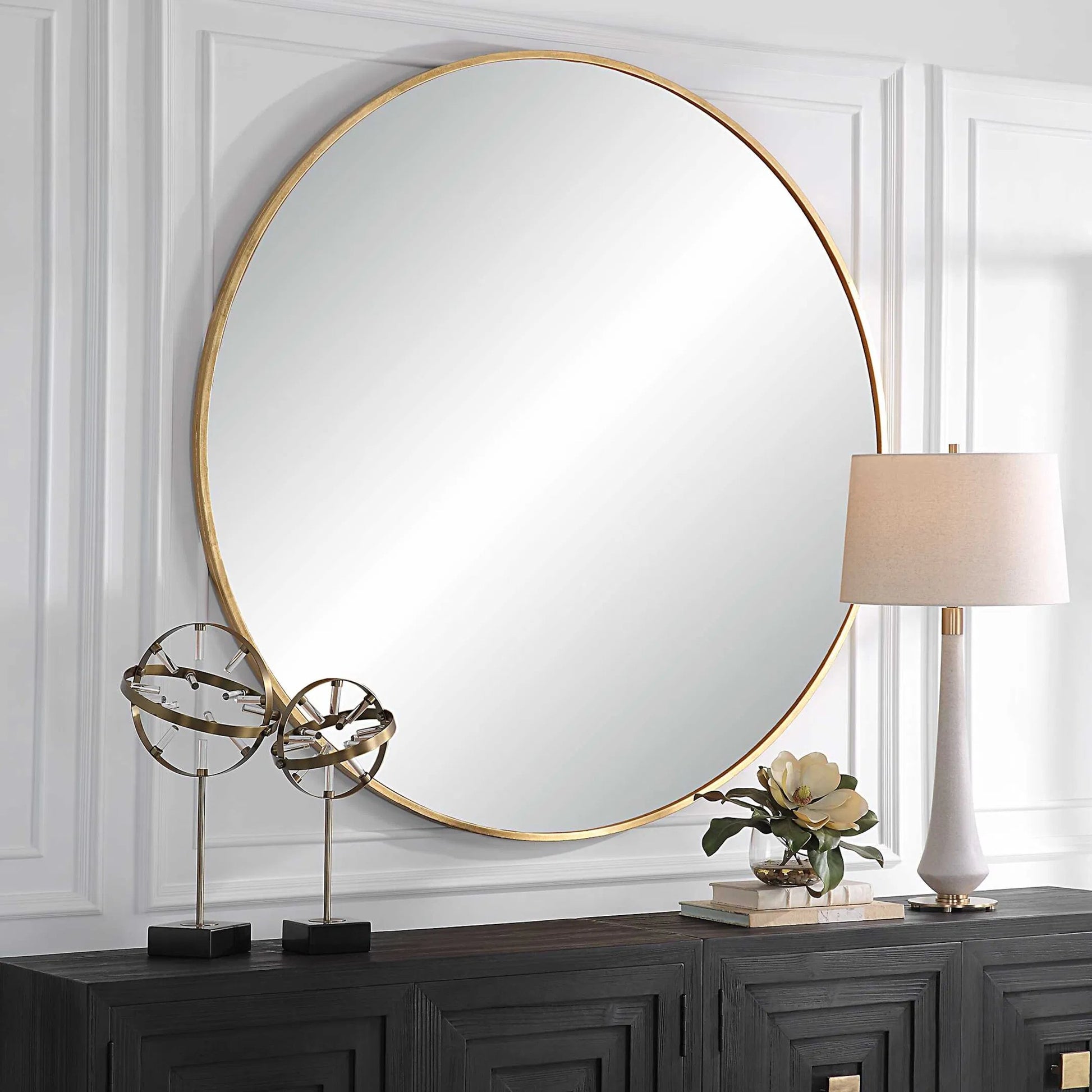 Junius Round Mirror by Uttermost in gold. Made from mirror, mdf, iron in a modern style.
