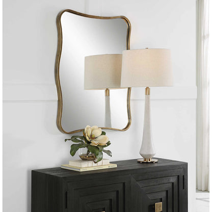 Pavia Curvy Vanity Mirror by Uttermost in gold. Made from iron, mirror, mdf in a modern style.