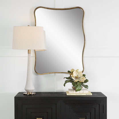 Pavia Curvy Vanity Mirror by Uttermost in gold. Made from iron, mirror, mdf in a modern style.