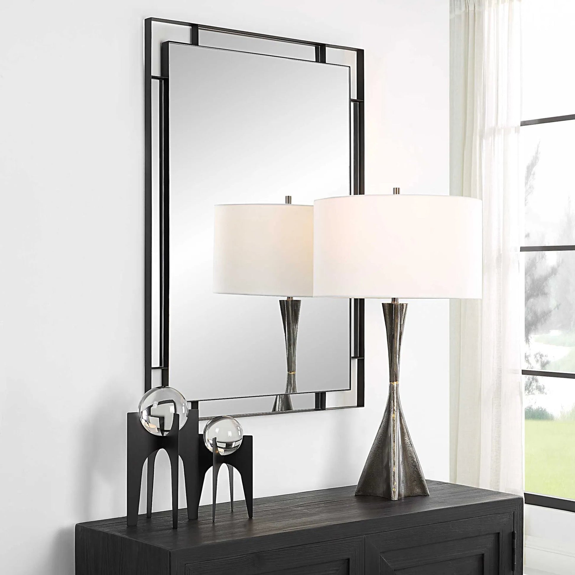 Stellan Mirror by Uttermost in black. Made from mirror, mdf, iron in a modern style.