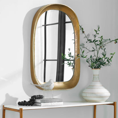 Bradano Arch Mirror by Uttermost in brass. Made from cast aluminum, glass, mdf in a modern style.