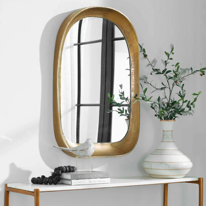 Bradano Arch Mirror by Uttermost in brass. Made from cast aluminum, glass, mdf in a modern style.