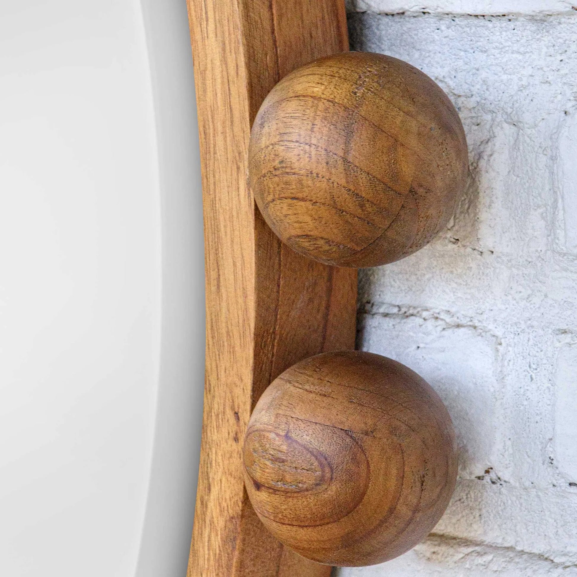 Cyra Beaded Round Mirror by Uttermost in walnut. Made from mahogany wood, carb mdf p2, glass, mtl in a modern style.