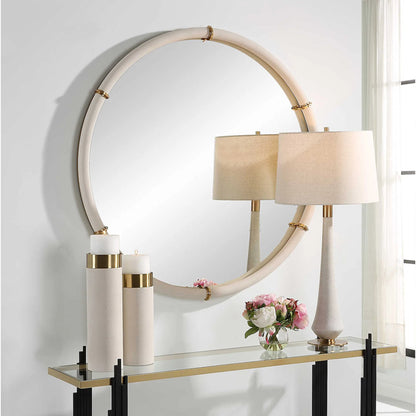 Cyprus Round Mirror by Uttermost in brass. Made from steel, mirror, mdf, pu leather, aluminum in a modern style.