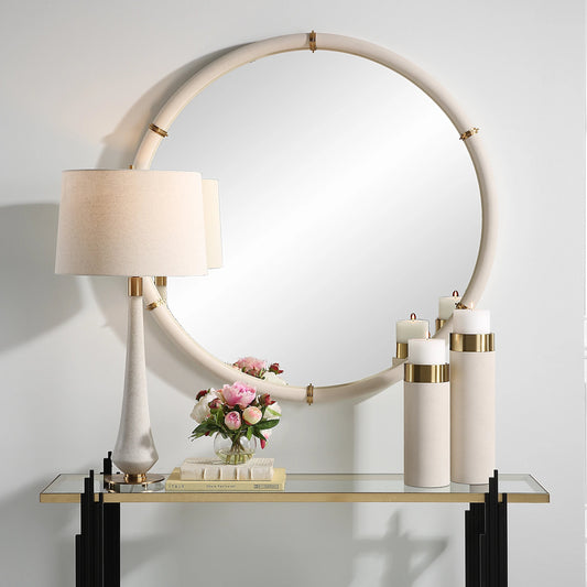 Cyprus Round Mirror by Uttermost in brass. Made from steel, mirror, mdf, pu leather, aluminum in a modern style.