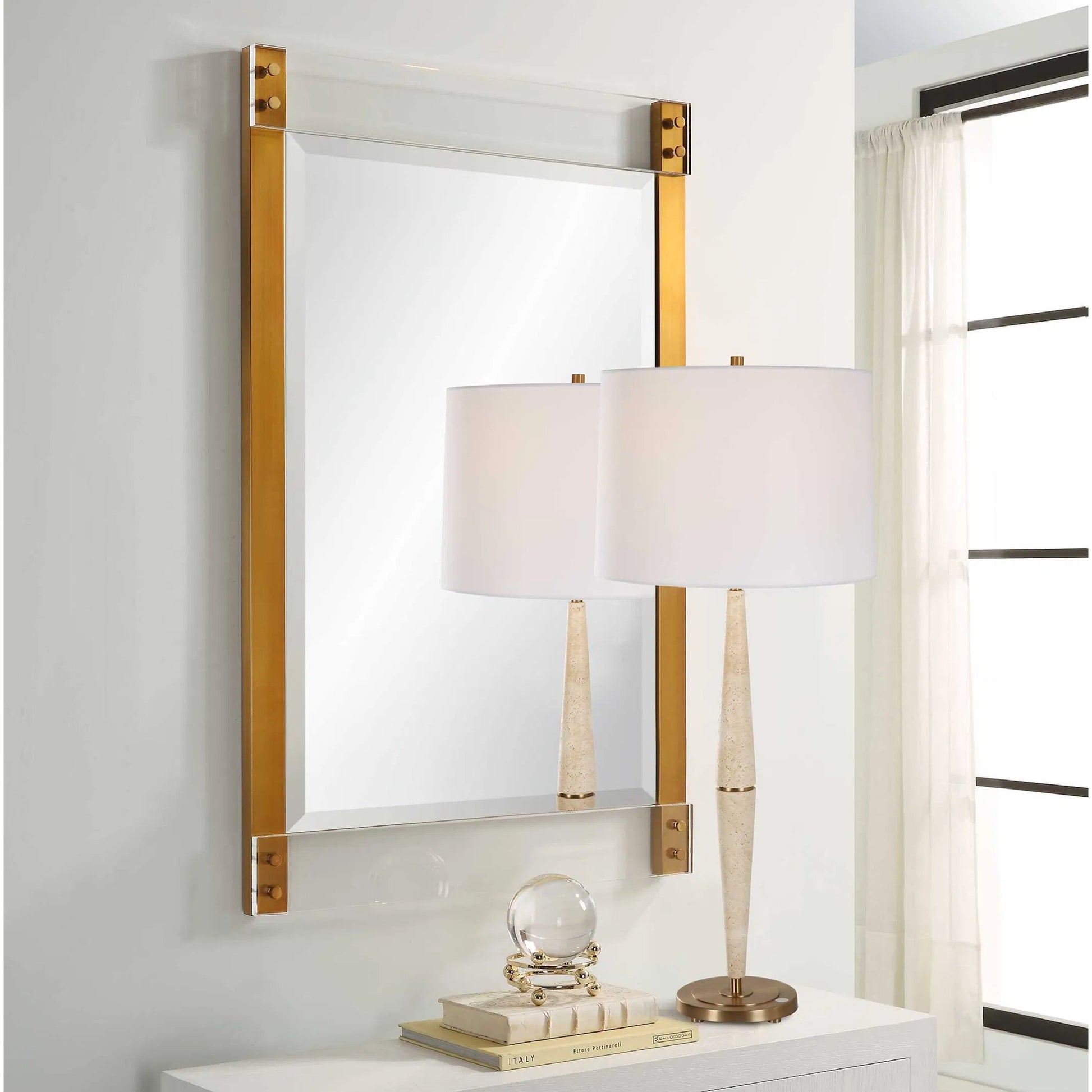 Nera Plated Mirror by Uttermost in brass. Made from stainless steel, acrylic, mirror, mdf in a modern style.