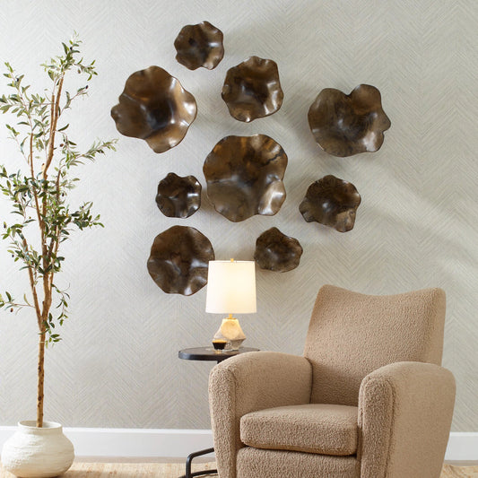 Two Wood Wall Art by Uttermost in brown. Made from tamarind wood in a unique style.