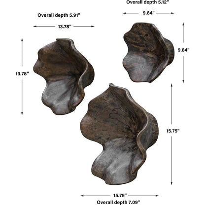 Two Wood Wall Art by Uttermost in brown. Made from tamarind wood in a modern style.