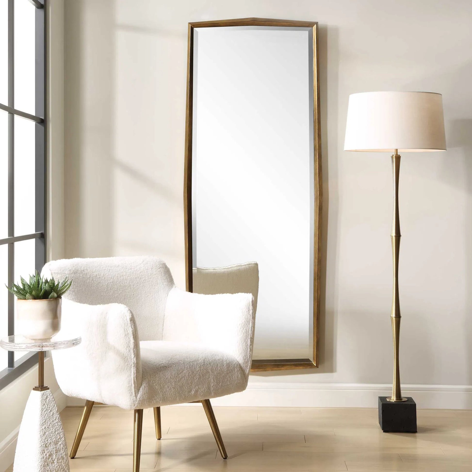 On Point Dressing Mirror by Uttermost in gold leaf. Made from mirror, mdf in a transitional style.