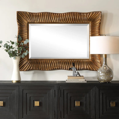 Emerson Scalloped Antique Mirror by Uttermost in gold leaf. Made from resin, mirror, mdf, iron in a modern style.