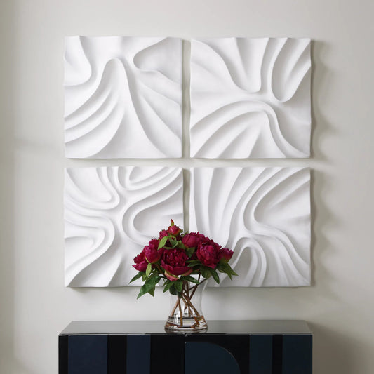 Snowdrift Scultped Wall Decor by Uttermost in white. Made from polyresin in a unique style.