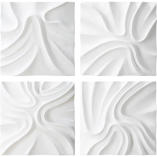 Snowdrift Scultped Wall Decor by Uttermost in white. Made from polyresin in a unique style.