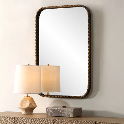 A Little Knotty Vanity Mirror by Uttermost in bronze. Made from mirror, iron, mdf in a transitional style.