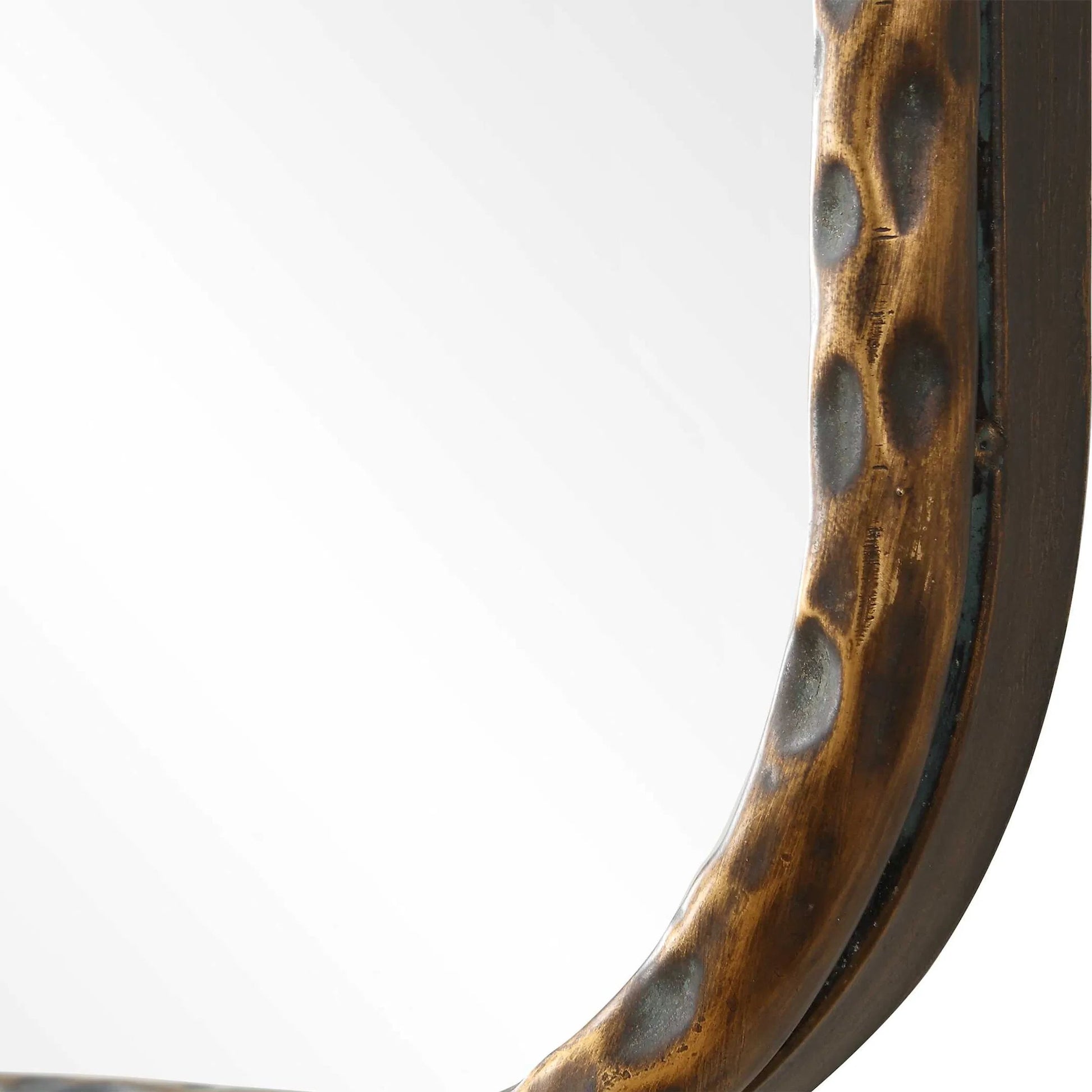 A Little Knotty Vanity Mirror by Uttermost in bronze. Made from mirror, iron, mdf in a transitional style.