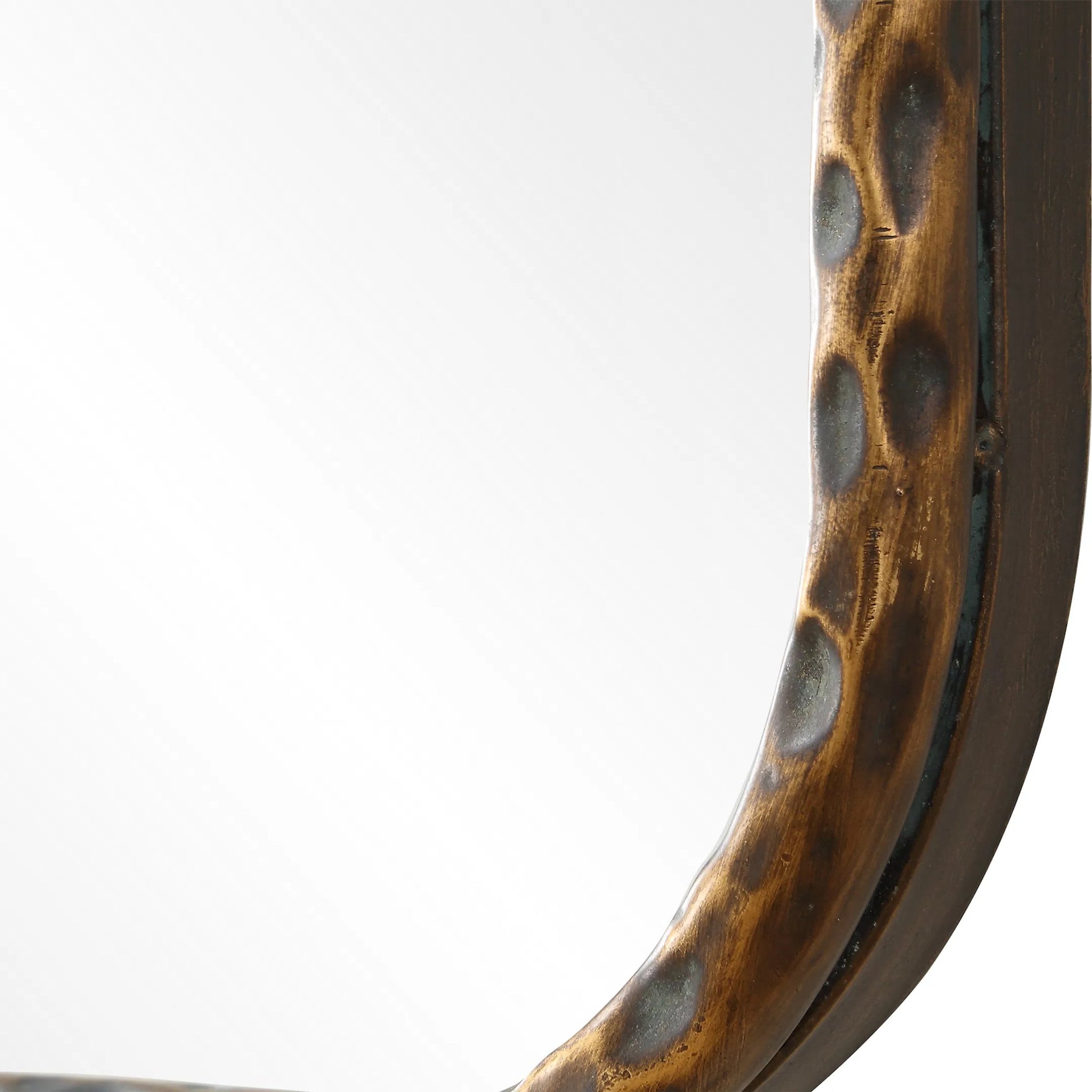 A Little Knotty Vanity Mirror by Uttermost in bronze. Made from mirror, iron, mdf in a transitional style.