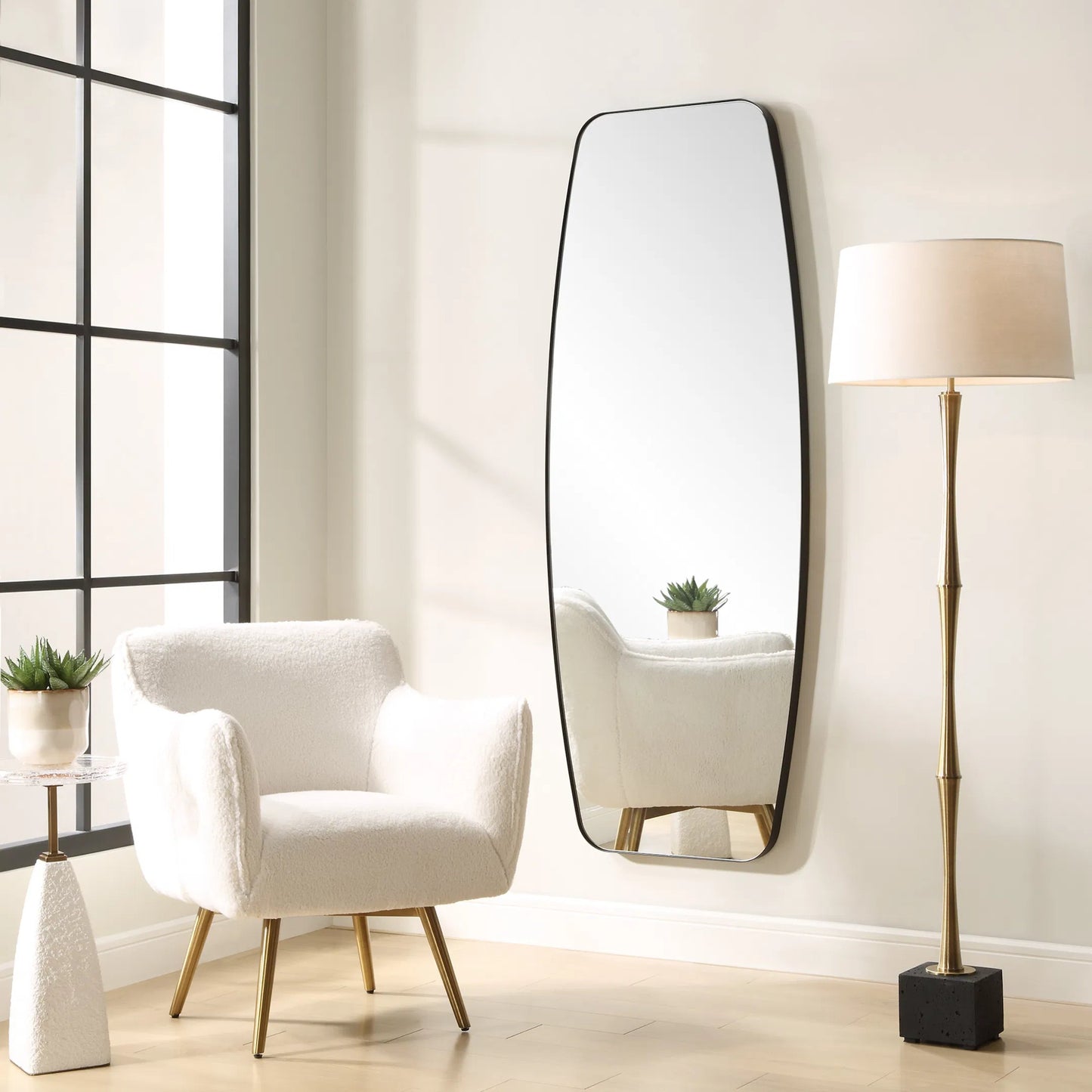 003 SI-2262146 | Lifestyle | Caspian Curved Dressing Mirror by Uttermost in black. Made from iron, mirror, mdf in a transitional style.