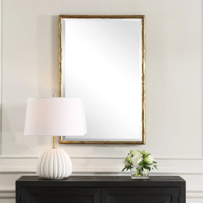 Sutton Vanity Mirror by Uttermost in gold. Made from iron, mirror, mdf in a transitional style.
