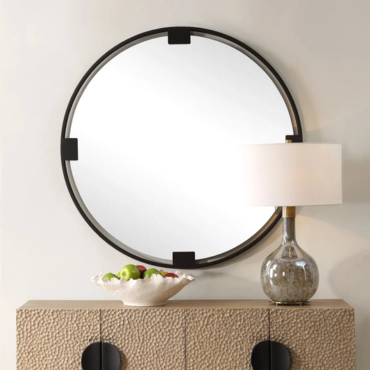 Cornelia Round Mirror by Uttermost in dark. Made from iron, mirror, mdf in a unique style.
