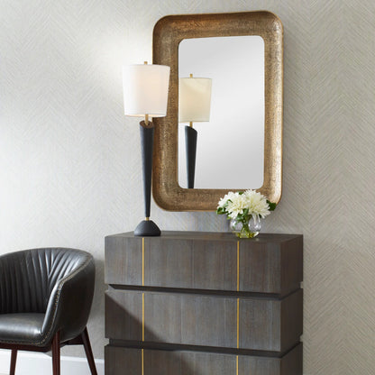 Alvaro Antique Mirror by Uttermost in brass. Made from aluminum, mdf, glass in a rustic style.