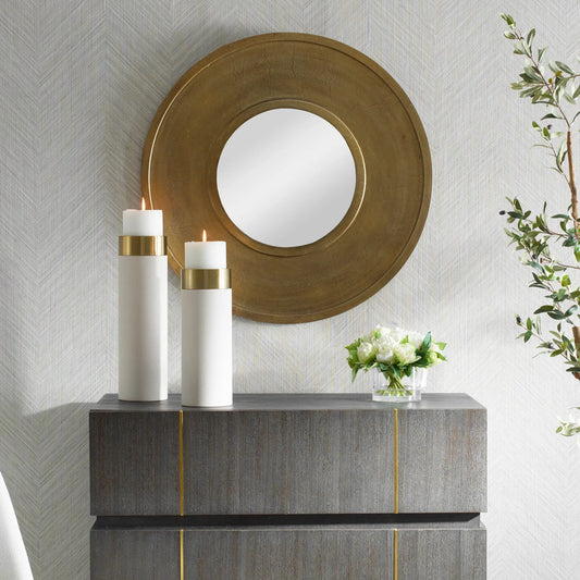 Axel Round Mirror by Uttermost in brass. Made from aluminum, mdf, glass in a unique style.