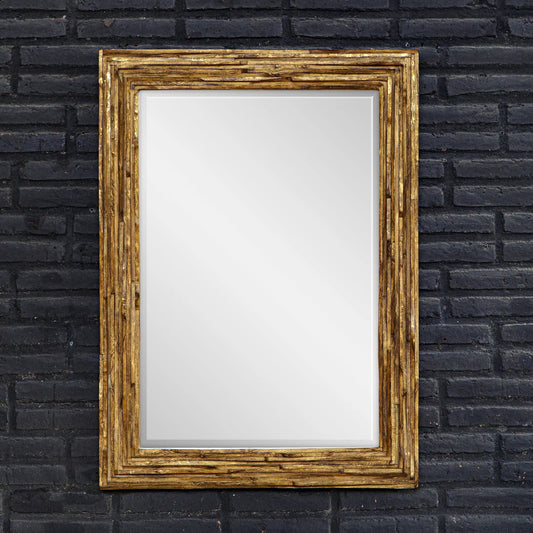 Overlap Mirror by Uttermost in antique gold leaf. Made from teak wood in a unique style.