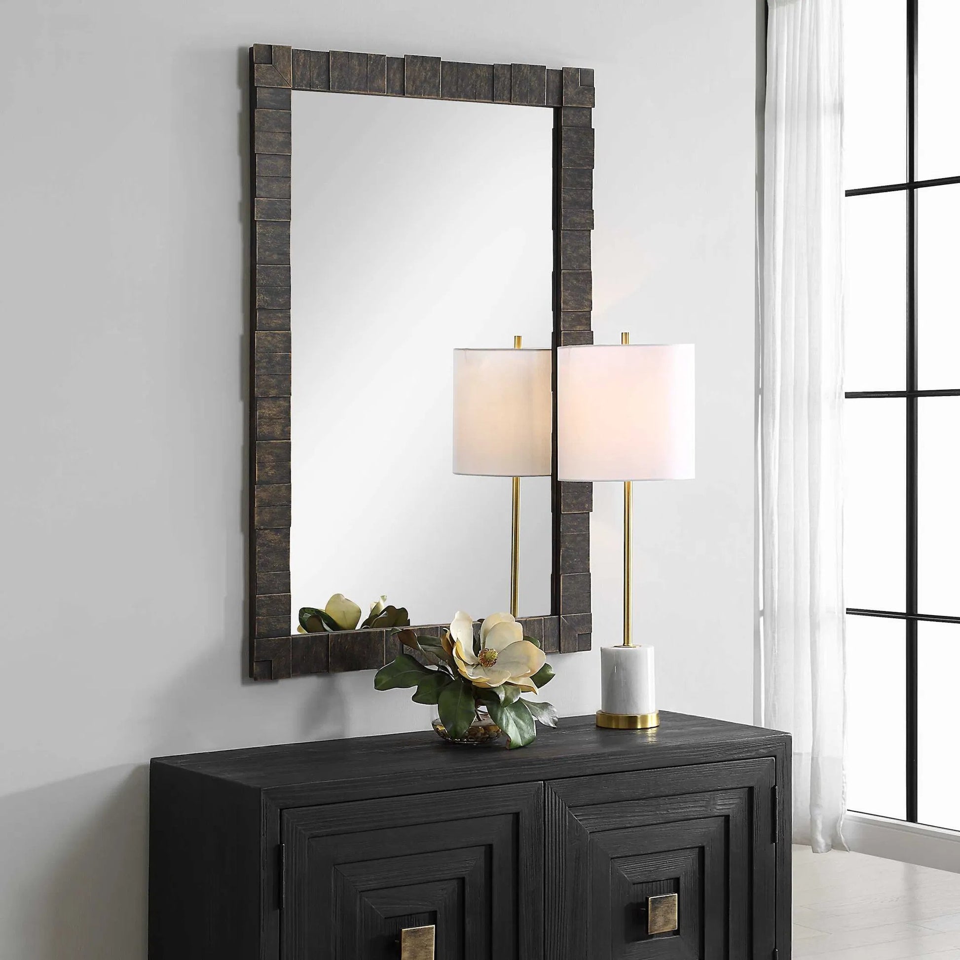 Bustelo Mirror by Uttermost in dark bronze. Made from iron, mdf, mirror in a modern style.