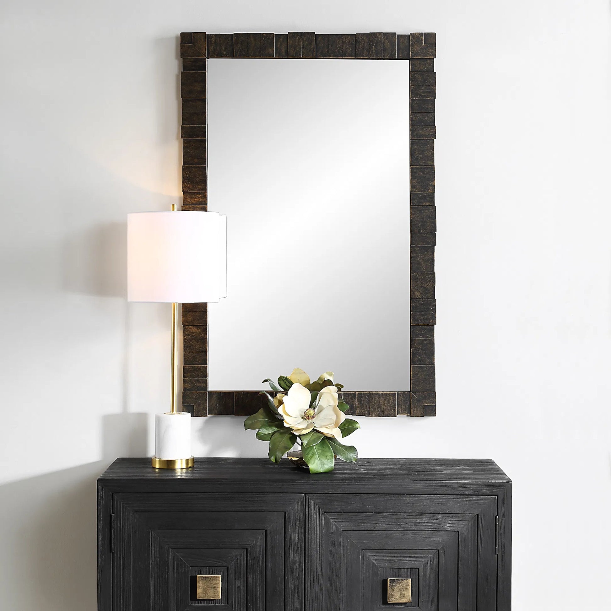 Bustelo Mirror by Uttermost in dark bronze. Made from iron, mdf, mirror in a modern style.