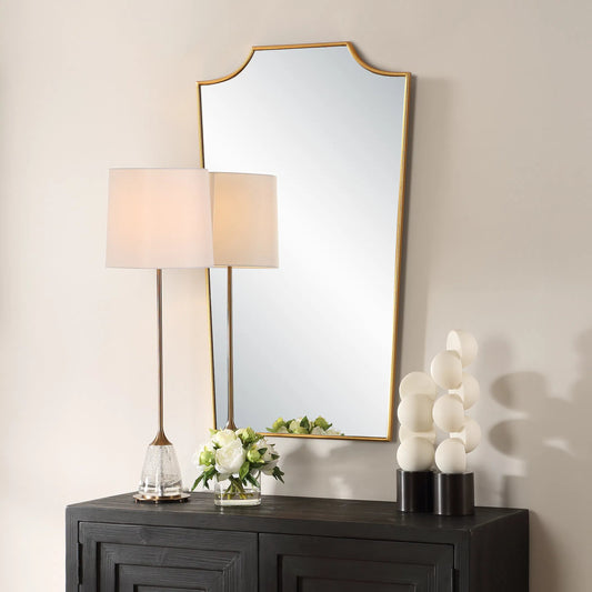 Demure Antique Mirror by Uttermost in gold leaf. Made from mirror, mdf in a transitional style.
