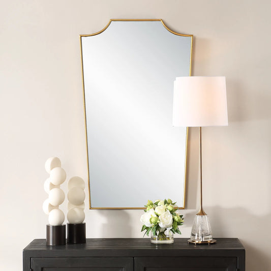 Demure Antique Mirror by Uttermost in gold leaf. Made from mirror, mdf in a unique style.
