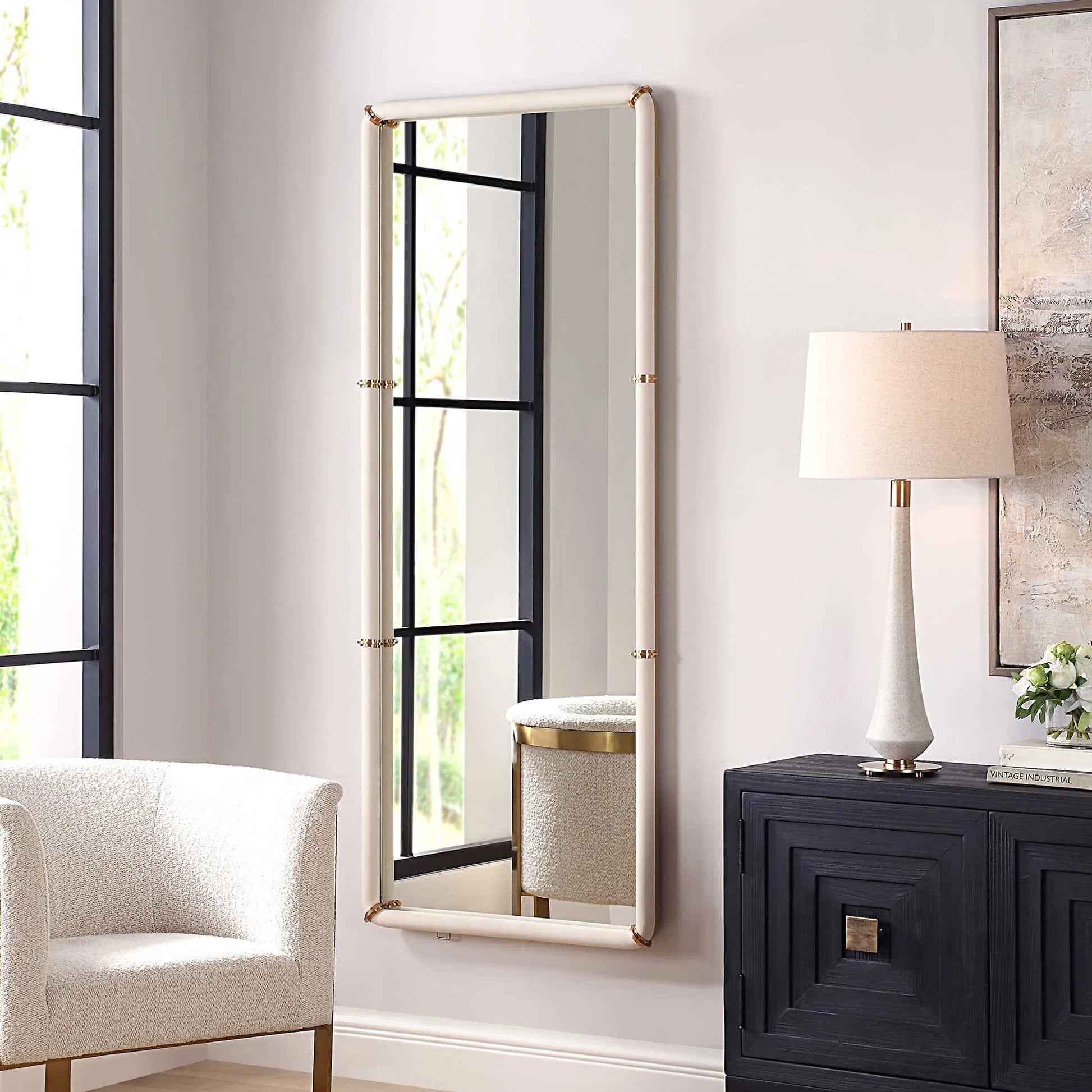 Cyprus Dressing Mirror by Uttermost in brass. Made from steel, mirror, mdf, pu leather, aluminum in a transitional style.