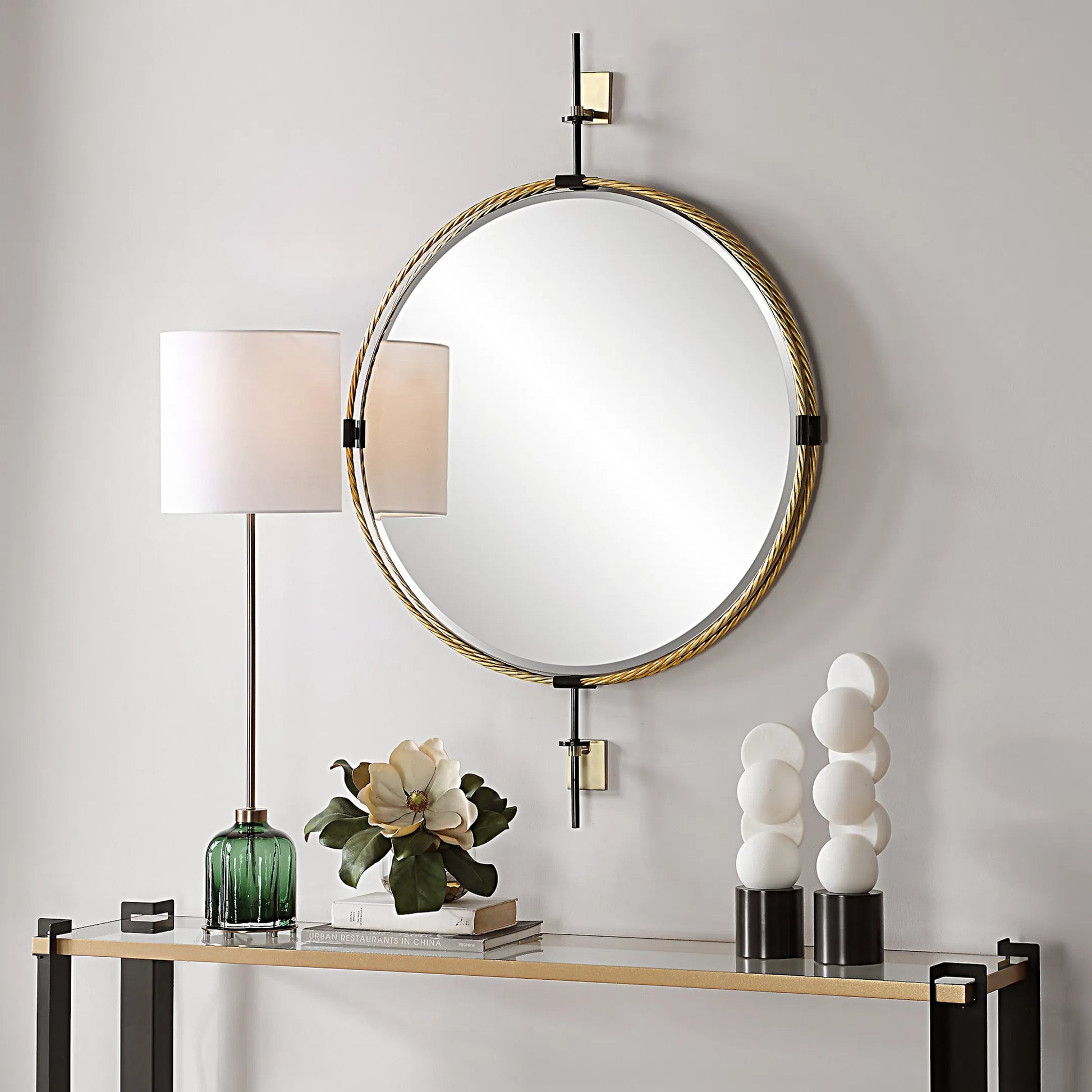 Guardrail Round Mirror by Uttermost in brass. Made from iron, mirror, mdf in a transitional style.
