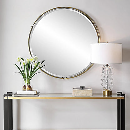 Wesley Round Mirror by Uttermost in brass. Made from iron, mirror, mdf in a transitional style.