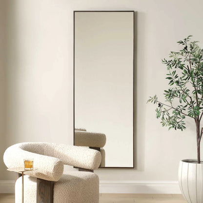 Patterson Dressing Mirror by Uttermost in bronze. Made from iron, mdf, mirror in a transitional style.