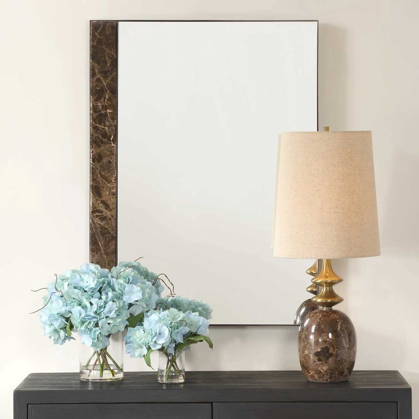 002 SI-2386567 | Lifestyle | Hanover Mirror by Uttermost in bronze. Made from iron, mirror, mdf, marble in a transitional style.